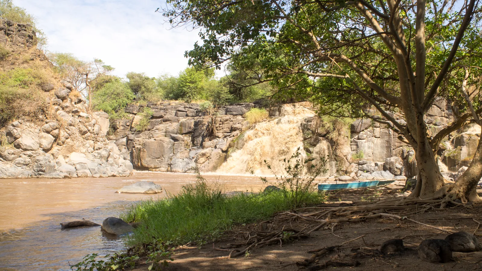 The Awash River cascading over dark rock ledges