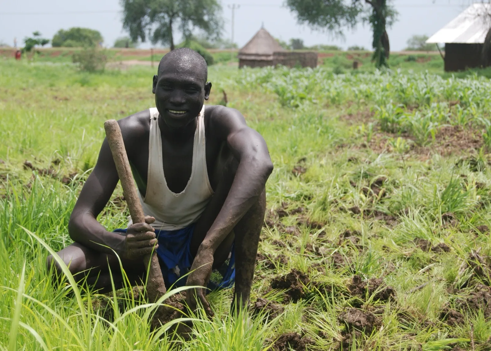 A farmer planting a field in the Gambella lowlands